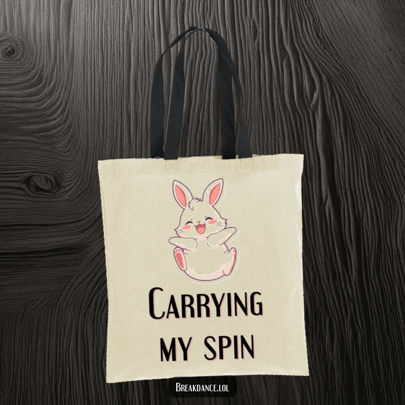 Funny tote bag featuring a fluffy bunny spinning on its back with legs kicking joyfully, perfect for carrying essentials with charm.